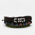 Boho multilayer leather bracelet set with green wooden beads and tribal fabric band by RRLUXECO, displayed on a neutral background.